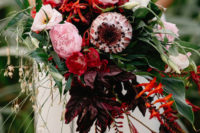 03 Tropics are known for their bold flowers, and they were incorporated into the decor and bouquets