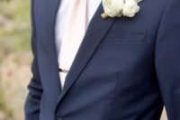 04 a navy suit and a blush tie for a stylish groom look