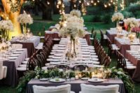 05 beautiful spring garden wedding reception with lights and greenery