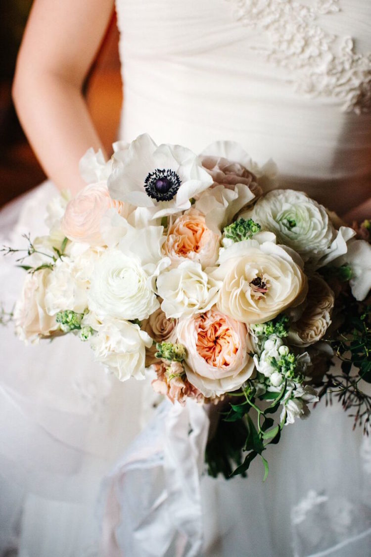 The bridal bouquet was delicate and sweet, with blush peonies and ivory flowers