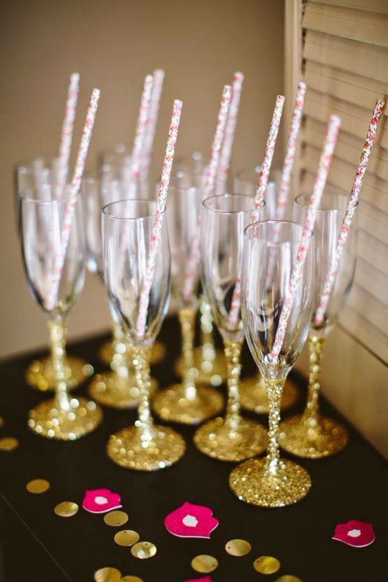 glitter champagne flutes and straws
