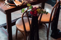 07 The chairs were decorated with bold blooms and black sequin fabric