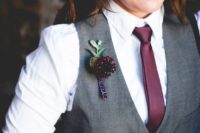 a grey vest, a white shirt, a burgundy tie and boutonniere are a classy and cool combo for a chic and stylish bridal look