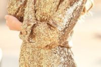 08 gold sequin romper with a low cut