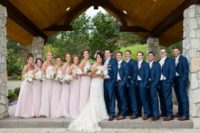 09 bridesmaids in blush gowns and groomsmen and the groom in navy