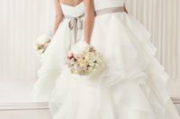 09 romantic sweetheart wedding dress with a layered skirt and a grey sash