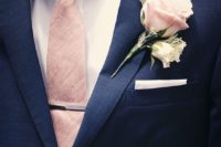10 stylish navy suit, a blush rose boutonniere and tie