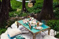 11 turquoise and white Morocco-inspired boho setting in the forest