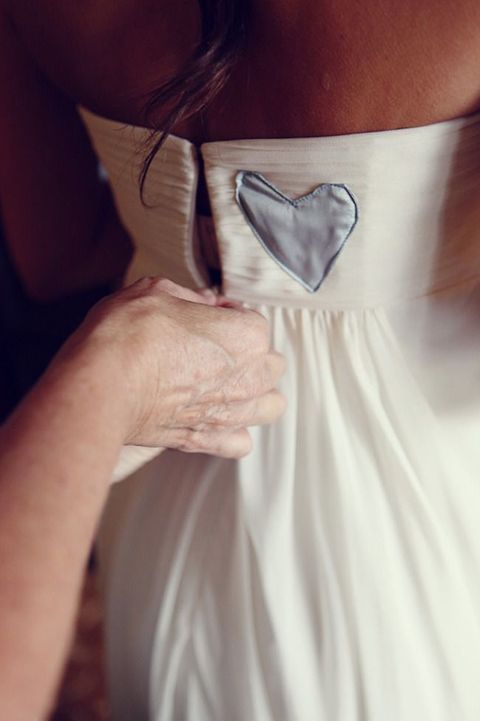 a pale blue heart insert for the wedding dress