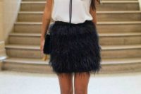 13 black feather mini, a white top and red heels to make a statement