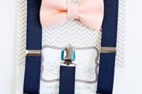13 navy denim suspenders and a blush bow tie