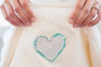15 tiffany blue heart attached to the dress on the inner side