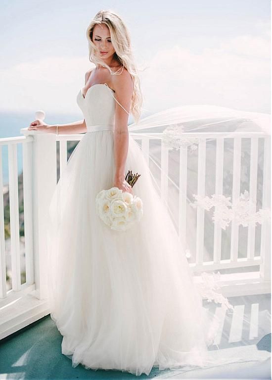 glam tulle spaghetti straps wedding dress for an effortlessly chic look