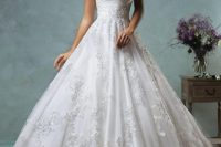 17 A-line ball gown with a lace skirt and a draped bodice