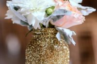 17 such a glitter mason jar can be made by yourself to use as a vase or centerpiece