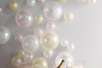 20 a bubbly bar with a balloon wall for fun