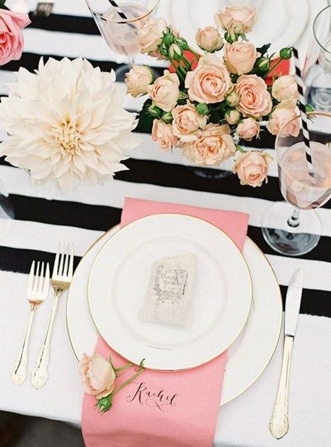 black and blush wedding table decor with pink and white touches