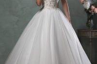 20 lace beaded bodice and a tulle skirt look chic together