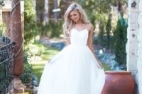 20 simple wedding dress with a tulle skirt and spaghetti straps for a modern bride