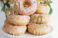 22 glazed donuts with glitter toppers