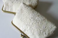24 a bride’s kisslock frame clutch made from a mother’s wedding dress