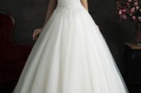 25 formal ball gown with a lace illusion bodice and a tulle skirt