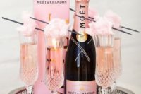 25 pink Moet champagne topped with candy cotton