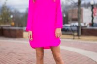 26 neon pink dress, ankle strap heels and a statement necklace