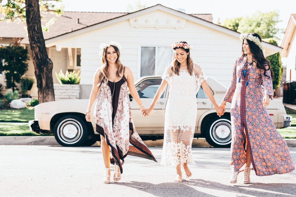 flowy boho gown with bold prints and floral crowns are amazing for such occasions