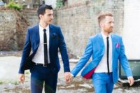28 grooms in the same suits in shades of blue – bold light blue and navy