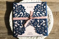 29 blush invitations and navy laser cut covers