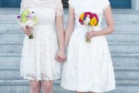knee-length wedding gowns with cap sleeves look cute together and are ideal for a vintage or retro wedding