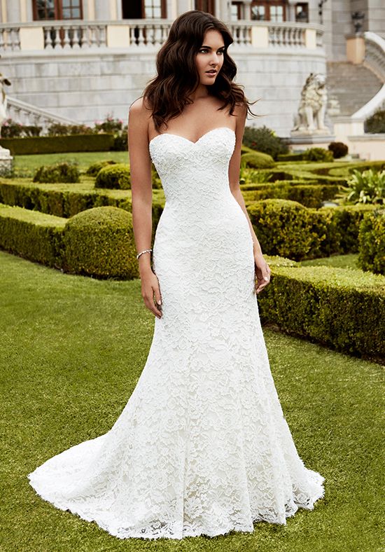 full-length sheath gown with a sweetheart neckline, delicate beaded appliques, and intricate corded lace overlay