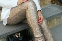37 a white shirt, sequin pants and red heels