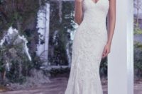 37 tulle and lace sheath wedding dress, with hand-placed lace appliqués