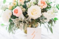 38 blush and ivory textural flower arrangement