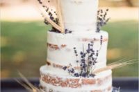 38 semi naked wedidng cake topped with lavender and spikes