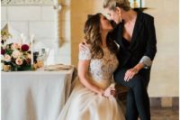 a trendy bridal separate with a short sleeve lace top and a tulle skirt, the second bride rocking a black pantsuit and black heels