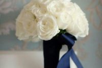 41 elegant bouquet of white roses and navy ribbon