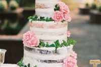 44 semi naked wedding cake with pink roses and a calligraphy topper