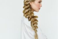 a dimensional and loose side braid will give a very delicate and romantic touch to your bridal look