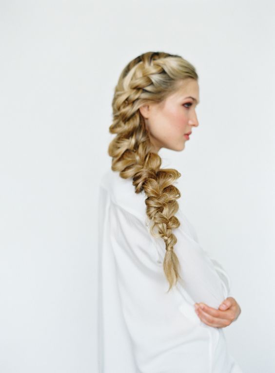 a dimensional and loose side braid will give a very delicate and romantic touch to your bridal look