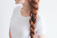 a ginger side twisted braid is a comfortable and cool idea for a boho or rustic bride with long hair