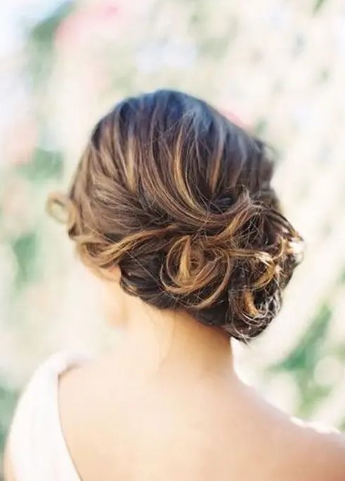 a gorgeous curly updo with a textural top is an elegant and stylish idea to go for