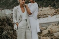 a neutral linen pantsuit, a white top and silver shoes, a white separate with a top with short sleeves and a skirt with a train