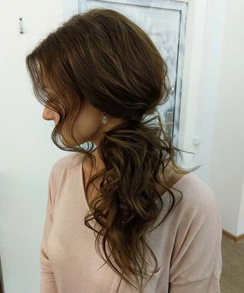 a wavy side swept ponytail with a volume on top is a lovely idea for a wedding, it's easy to repeat