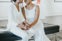 a white pantsuit, white shoes, a plain white mermaid wedding dress with a train are amazing outfits for a modern wedding