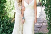 an elegant plain spaghetti strap V-neckline wedding dress, a boho lace A-line wedding dress with long sleeves and a train