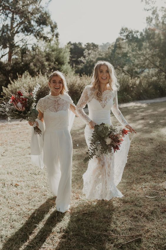 boho bridal looks, a plain jumpsuit with a lace cover, a boho lace wedding dress with a train are an amazing combo for a boho wedding