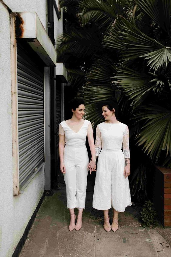 brides wearing a jumpsuit with cap sleeves and nude shoes, a separate with boho lace culottes and a crop top and nude shoes